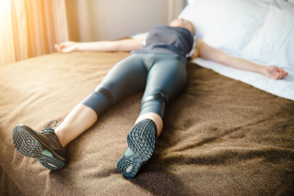 Woman having a rest after run and hard workout